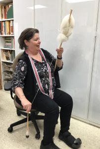 Spinning with a distaff